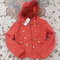 تعدادی لباس و کیف و چکمه با قیمت بسیار ارزان