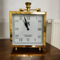 ساعت رومیزی و ظروف هفتسین