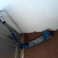 یک عدد اسکوتر جنس محکم