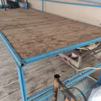 دو عدد تخت رستوران قهوه خونه و حیاط