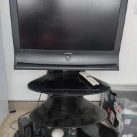 تلویزیون و میز و اسپیکر