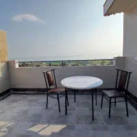 واحد آپارتمانی نوساز،جنب بازارچه ساحلی، روف گاردن