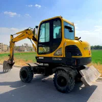 مینی بیل مکانیکی لاستیکی r55