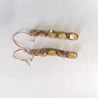 گوشواره طلایک درصد بالای تابلو