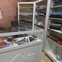 دکور قفسه پوشاک و شال فروشی و فروشگاه