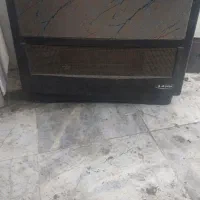 یک عدد بخاری با اجاق گاز