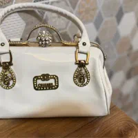 کیف مجلسی|کیف، کفش، کمربند|قم, شاه سید علی|دیوار