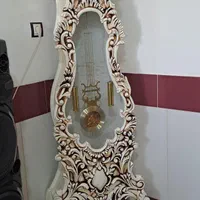 بوفه ،ساعت ایستاده ،اجاق گاز،ایینه و شمعدان