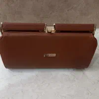 کیف|کیف، کفش، کمربند|تربت‌حیدریه, باغ سلطانی|دیوار