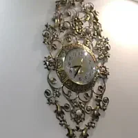 ساعت برنجی گل مسی و برنجی   آینه دکوراتیو