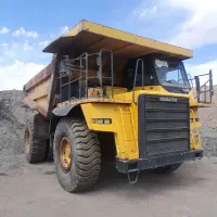 راننده  تراک و بیل مکانیکی