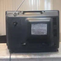 تلویزیون قدیمی|کلکسیون اشیاء عتیقه|شیراز, گل سرخ|دیوار