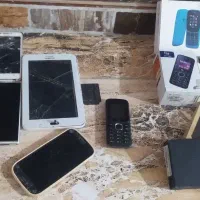 گوشی های خراب وتعدادی گلس وقاب گوشی