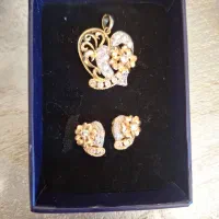 گوشواره و مدال طلا