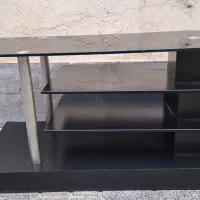زیر تلوزیون شیشه ای در حد نو
