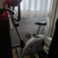 دوچرخه ثابت وکمربند ویبره چربی سوز