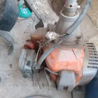 دستگاه علف زنی.و ۲عدد درب دستی چدنی
