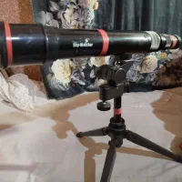 دوعددتلسگوپ بایک عدد دوربین فیلمبرداری