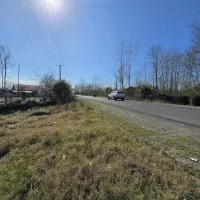 زمین برجاده اصلی با موقعیت تجاری