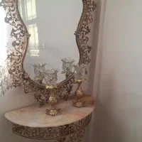 آیینه شمعدان.روتختی گلدوزی شده.ساعت دیواری