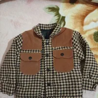 کاپشن|کفش و لباس بچه|خاوه, |دیوار