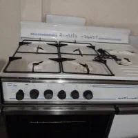 اجاق گاز ۵شعله فردار کشو دار و کمد بغل بسیار سالم