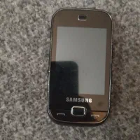 گوشی لمسی با باشارژر و هندزفری