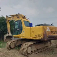 بیل مکانیکی  کوماتسو  گاز دستی