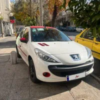 ماشین پژو 207 mc سفید قرمز