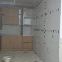 کاشی کاری دوغابی چسپی کف بدنه بین کابینتی