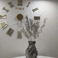 گلدان به همراه گل مصنوعی