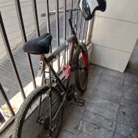 دوچرخه به همراه کلا کاسکت