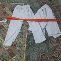 لباس کاراته با کمربند نارنجی