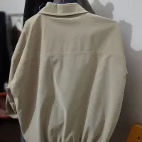 کاپشن|لباس|فیرورق, |دیوار