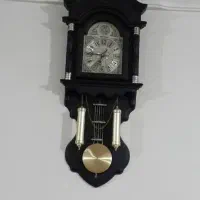 ساعت وگلدان