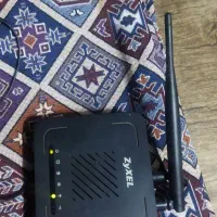 مودم زایکسل کاملا سالم به همراه آداپتور|مودم و تجهیزات شبکه|فومن, |دیوار