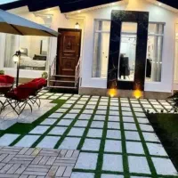 به یک نفر خانم جهت نگهداری از باغ ویلا