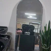 آینه کج ایستاده