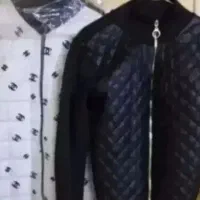 2عددکاپشن مردانه سفیدمشکی نوشیک سایز فری زیرقیمت