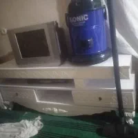 میزه تلویزیون  و جارو برقی