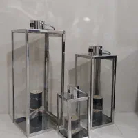 فانوس به همراه شمع ها ، شلف دیواری با گلدان