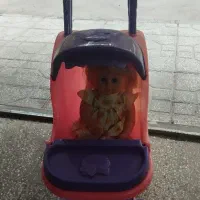 اسباب بازی کالسکه به همراه عروسک
