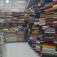 حراج بزرگ پارچه در گناباد پاساژ مولوی پارچه عروس