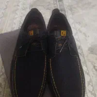 یک عدد کفش نو استفاده نشده