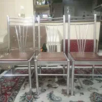 میز غذا خوری استیل شیشه ای بهمراه صندلی صندلی