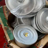 چندین زودپز  و اجاق گاز تک شعله