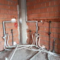 تاسیسات آب وفاضلاب شوفاژ گرمایش از کف وخدمات.فنی