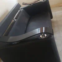 مبل هفت نفره با تعداد زیادی بالشتک از همین جنس