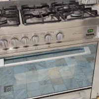 اجاق گاز و تلویزیون و بخاری شومینه ای