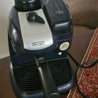قهوه ساز دلونگی و ظروف چینی